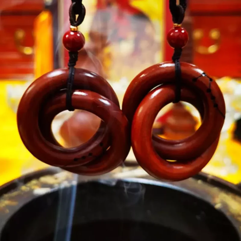 Authentic lightning-struck wood ring infused with Taoist symbolism for protection.