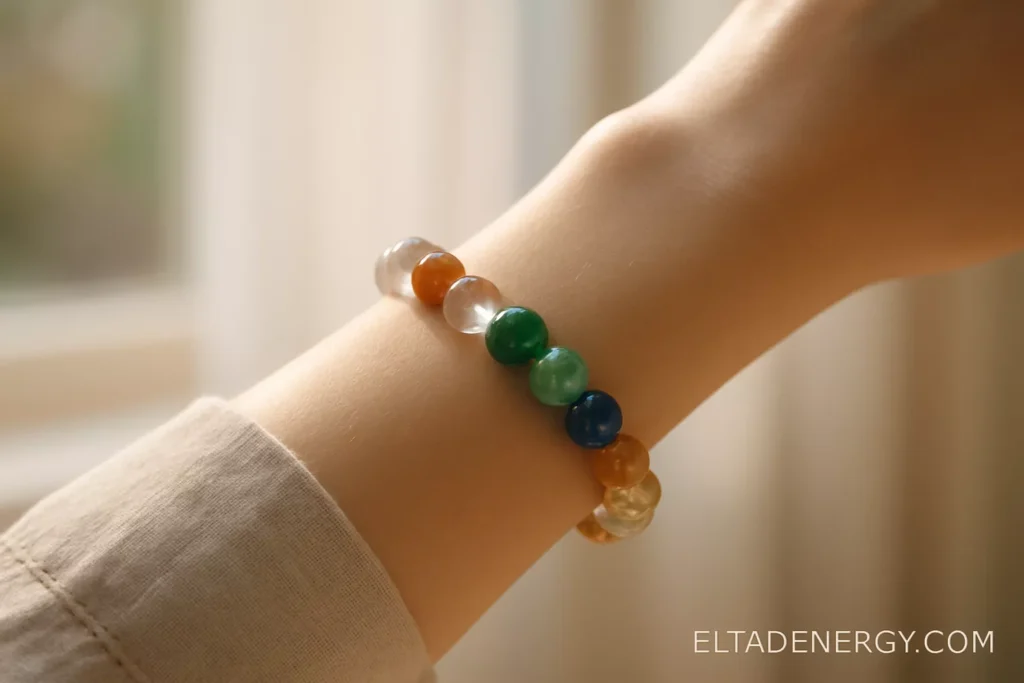 A close-up shot of a hand wearing a custom crystal bracelet, soft sunlight through the window.